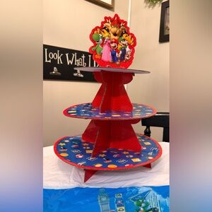 Super Mario Party supplies! Cupcake Stand, banner, cupcake toppers, plates, etc